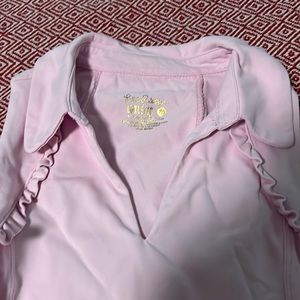 Pink golf shirt